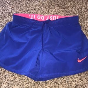 Nike Dri Fit shorts. Blue and neon orange. Size XS